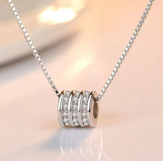 COLLAR CILINDRO PIEDRA BLANCA PLATEADO