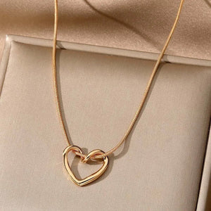 Collar Corazón Lazo Dorado