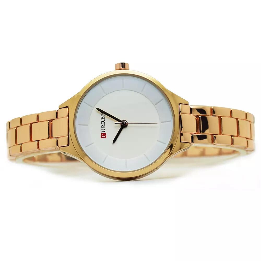 Reloj curren French dorado fondo blanco