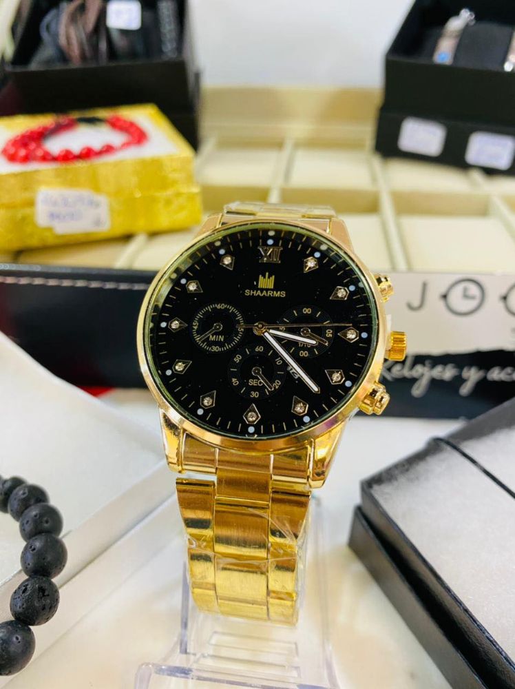RELOJ GENEVA SHAARMS DORADO F/NEGRO